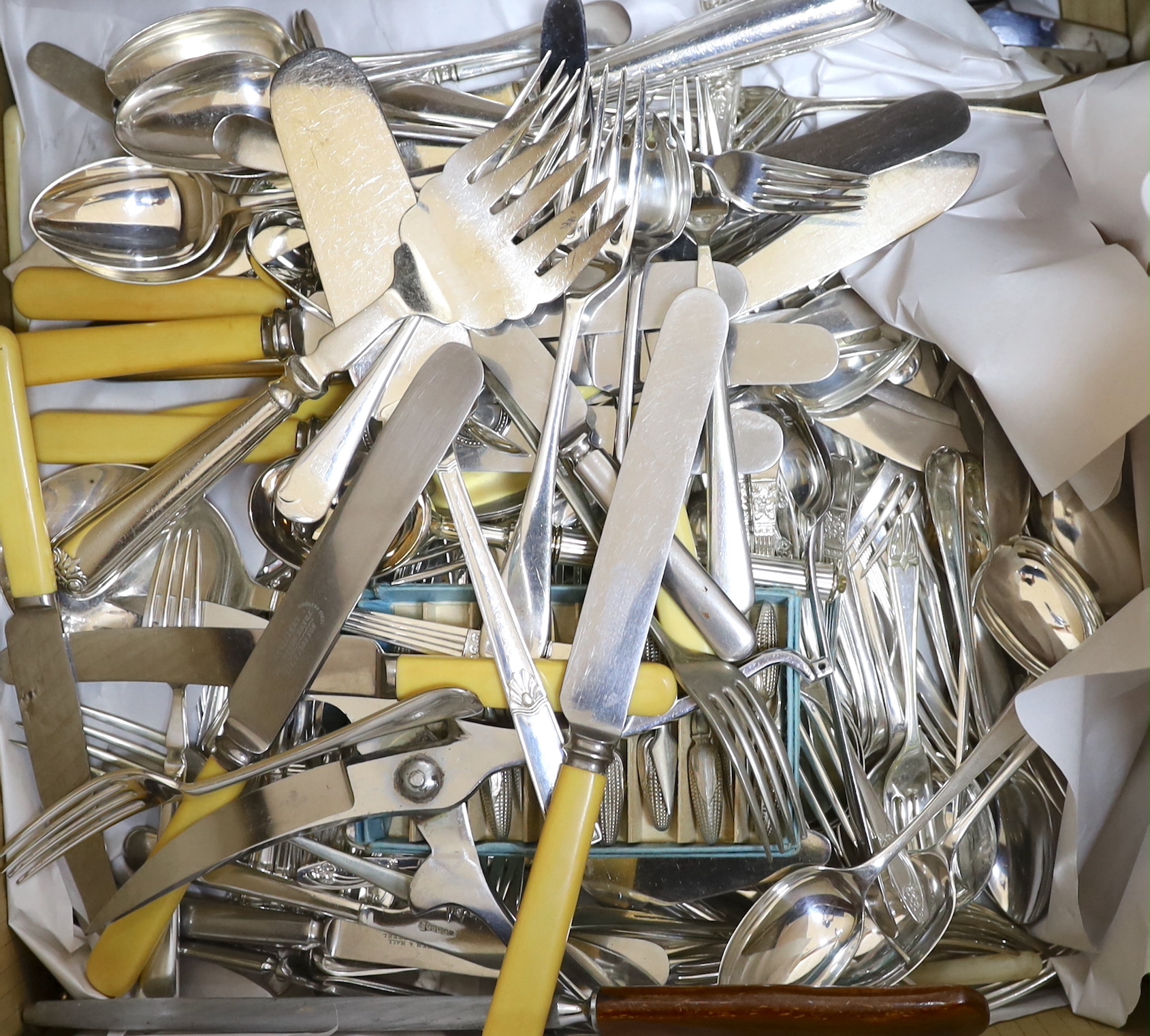 A large quantity of assorted plated cutlery, including a part canteen of Valiant Plate cutlery